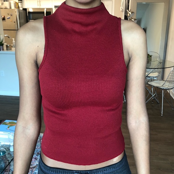 red turtleneck sleeveless top